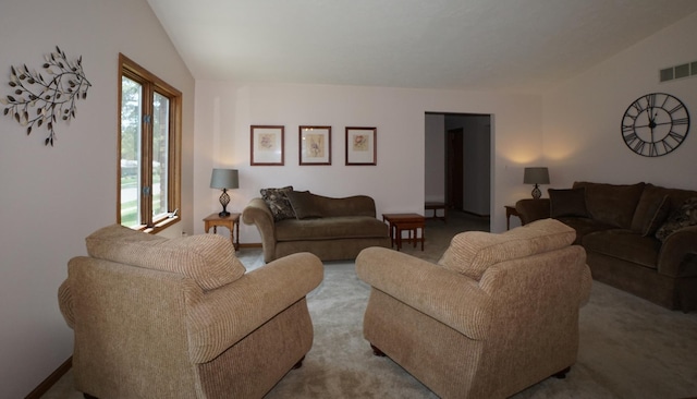 6924 Cody Ln, Rockford, IL 61107 - carpeted living room with lofted ceiling