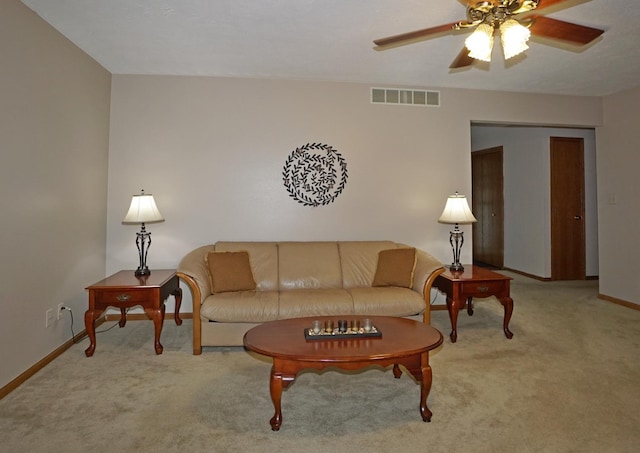 6924 Cody Ln, Rockford, IL 61107 - living area with light carpet and ceiling fan