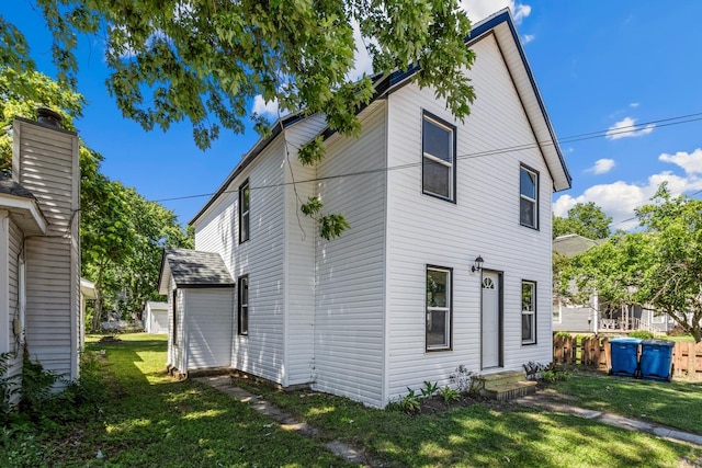 1213 W Fourth St, Dixon, IL 61021 - back of property with a yard