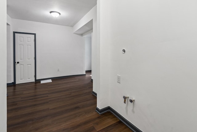 1213 W Fourth St, Dixon, IL 61021 - empty room with baseboards and dark wood-style flooring