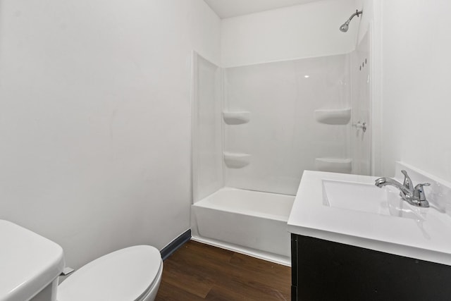 1213 W Fourth St, Dixon, IL 61021 - full bath with wood finished floors, vanity, and shower / tub combination