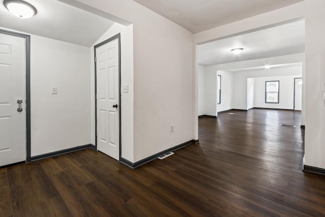 1213 W Fourth St, Dixon, IL 61021 - foyer with dark wood-style floors and baseboards