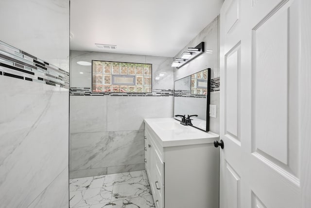 3832 W 81st St, Chicago, IL 60652 - full bath featuring vanity, marble look tile flooring, and tiled shower