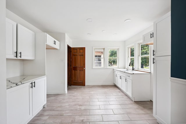 3832 W 81st St, Chicago, IL 60652 - kitchen with white cabinets, light wood-style floors, and recessed lighting