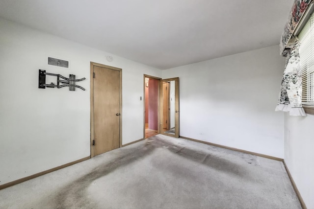 210 N Russel St, Mount Prospect, IL 60056 - carpeted spare room featuring baseboards and a smoke detector