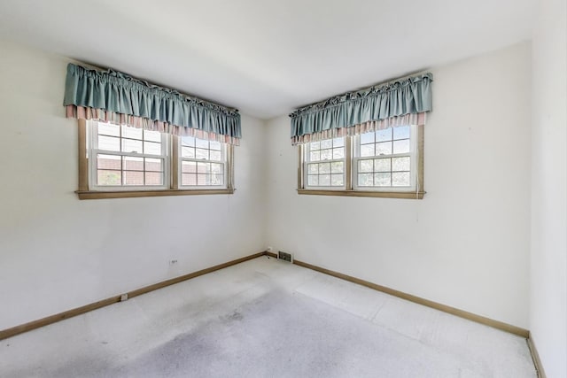 210 N Russel St, Mount Prospect, IL 60056 - carpeted empty room with baseboards