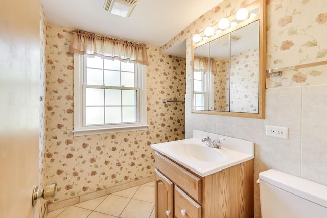 210 N Russel St, Mount Prospect, IL 60056 - half bath with vanity, tile patterned floors, and wallpapered walls