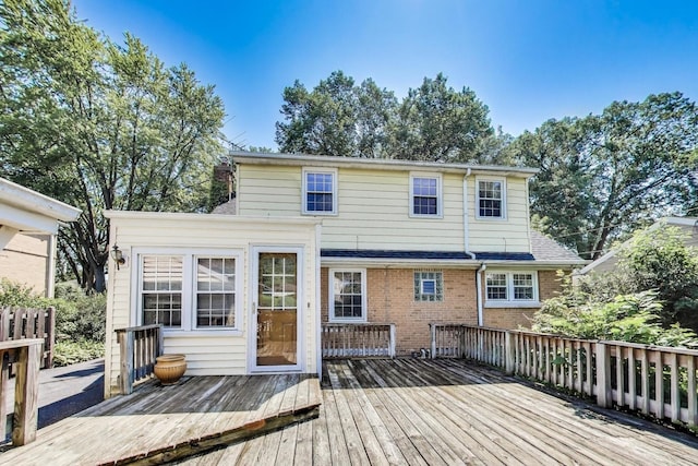210 N Russel St, Mount Prospect, IL 60056 - back of property with a deck and brick siding