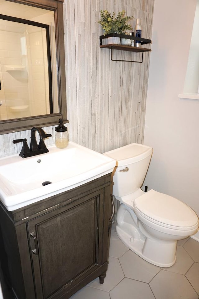 4452 N Newland Ave, Harwood Heights, IL 60706 - bathroom with vanity, wood walls, and tile patterned flooring