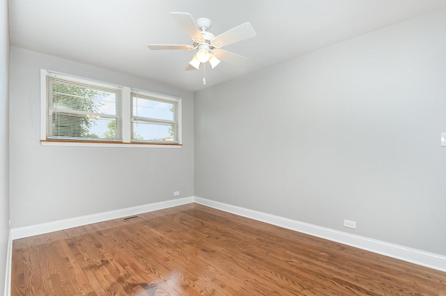 1203 W 110th St, Chicago, IL 60643 - empty room featuring wood finished floors and a ceiling fan