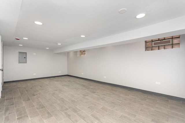 1203 W 110th St, Chicago, IL 60643 - finished below grade area with electric panel, recessed lighting, and light wood-type flooring