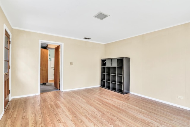 137 School St, Grayslake, IL 60030 - empty room featuring light wood-style floors and crown molding