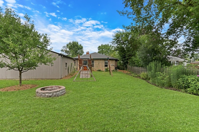 137 School St, Grayslake, IL 60030 - view of yard featuring an outdoor fire pit