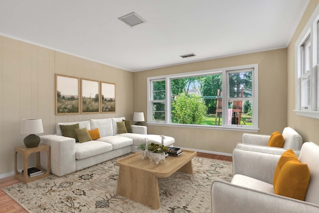 137 School St, Grayslake, IL 60030 - living area with healthy amount of natural light, wood finished floors, and ornamental molding