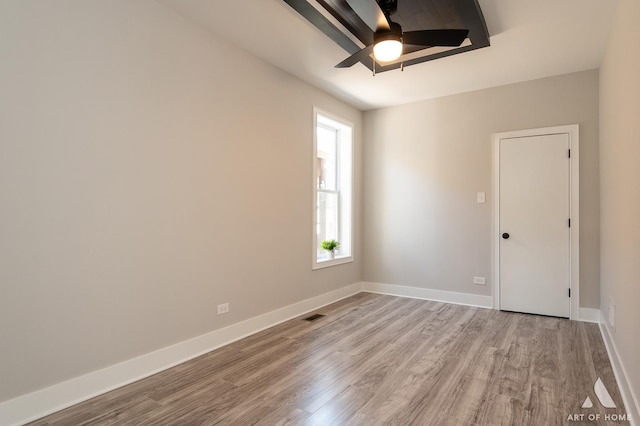 7945 S Avalon Ave, Chicago, IL 60619 - spare room with ceiling fan and wood finished floors