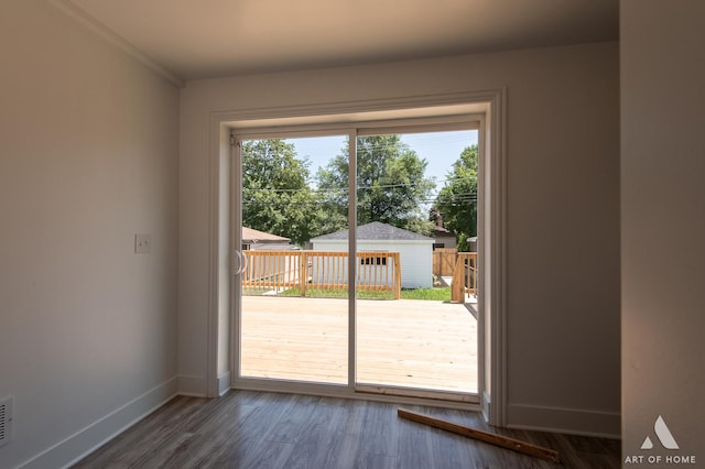 7945 S Avalon Ave, Chicago, IL 60619 - entryway featuring baseboards and dark wood-style flooring