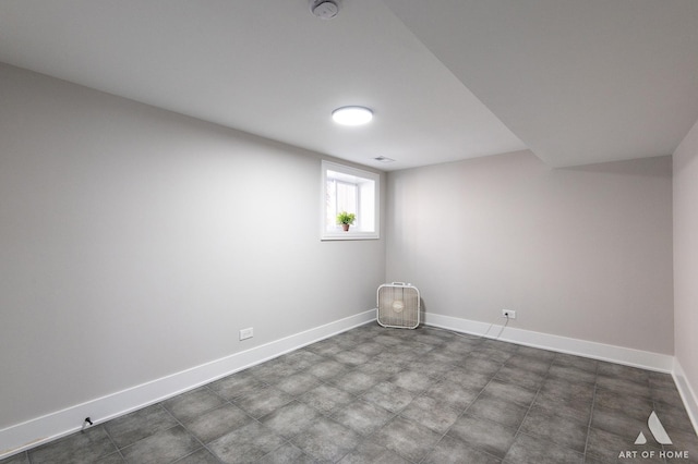 7945 S Avalon Ave, Chicago, IL 60619 - spare room featuring a smoke detector and baseboards