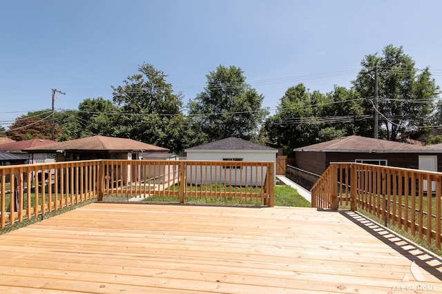7945 S Avalon Ave, Chicago, IL 60619 - wooden deck featuring an outbuilding