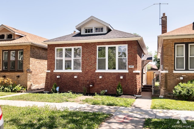 7945 S Avalon Ave, Chicago, IL 60619 - bungalow-style house with brick siding
