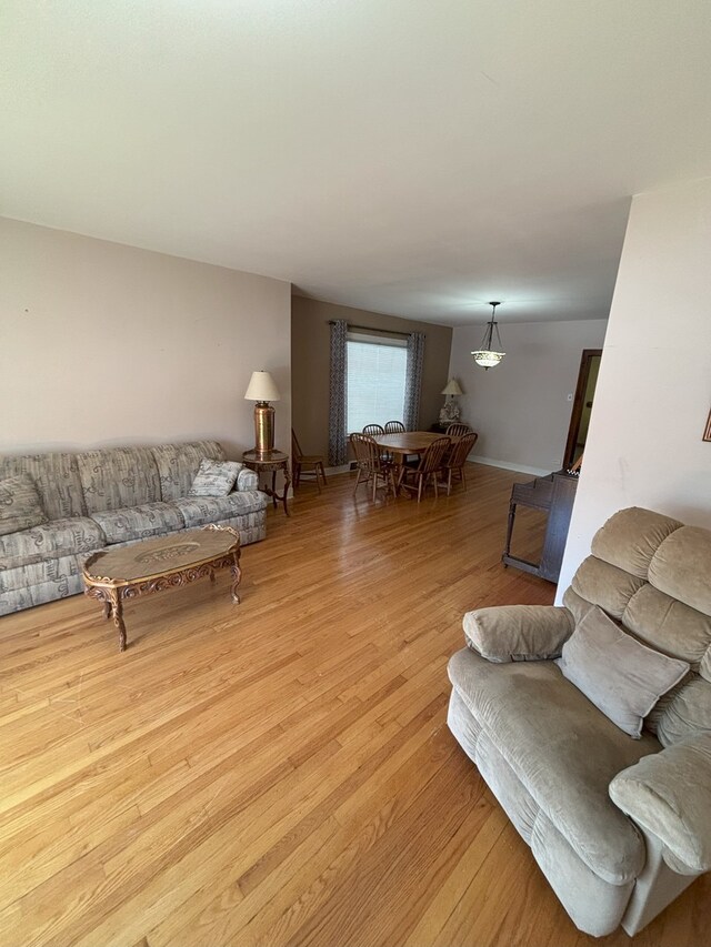 4304 N Oriole Ave, Norridge, IL 60706 - living area with light wood-style floors