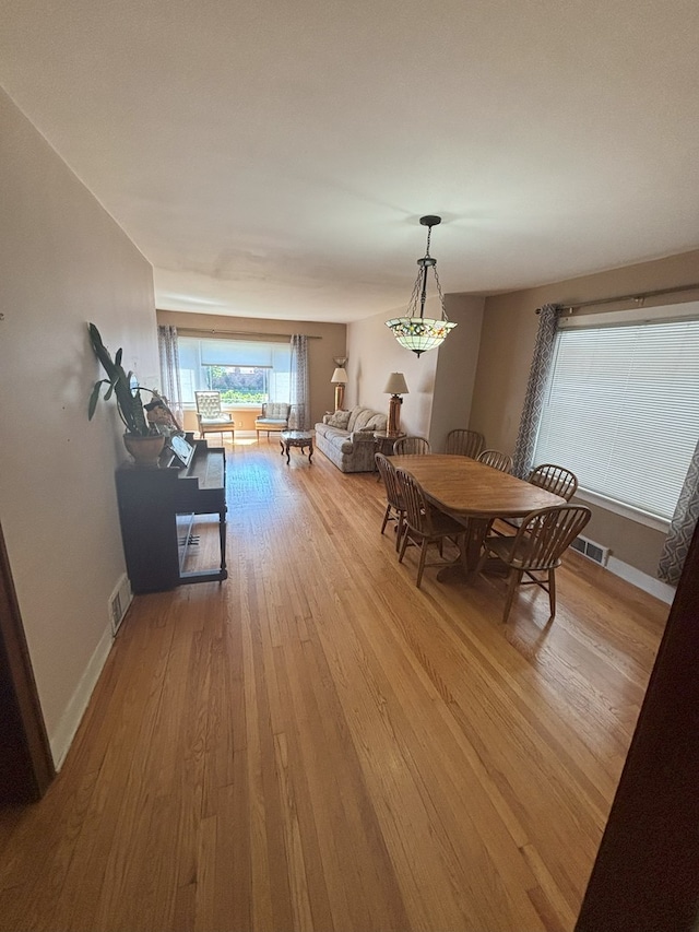 4304 N Oriole Ave, Norridge, IL 60706 - dining area with wood finished floors and baseboards