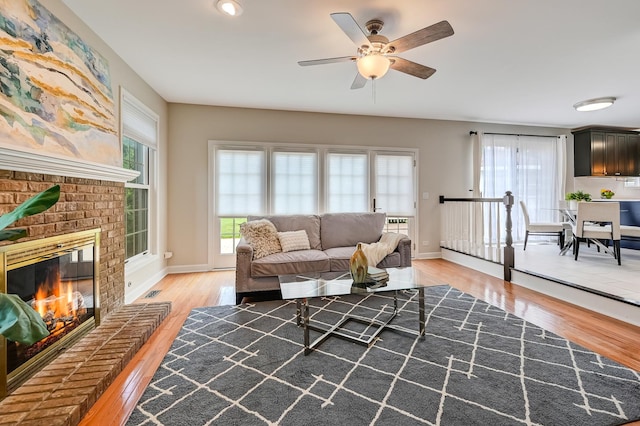 1501 Pine View Ct, Darien, IL 60561 - living room with light wood-style floors, healthy amount of natural light, and ceiling fan