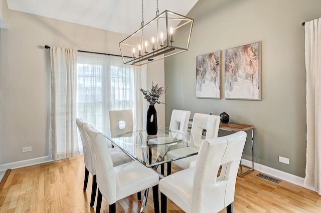 1501 Pine View Ct, Darien, IL 60561 - dining room with a chandelier and light wood-style floors