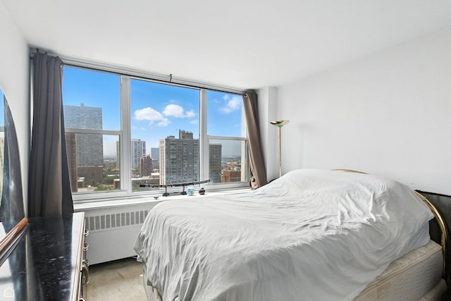 4250 N Marine Dr Unit 1912, Chicago, IL 60613 - bedroom featuring a view of city, multiple windows, and radiator