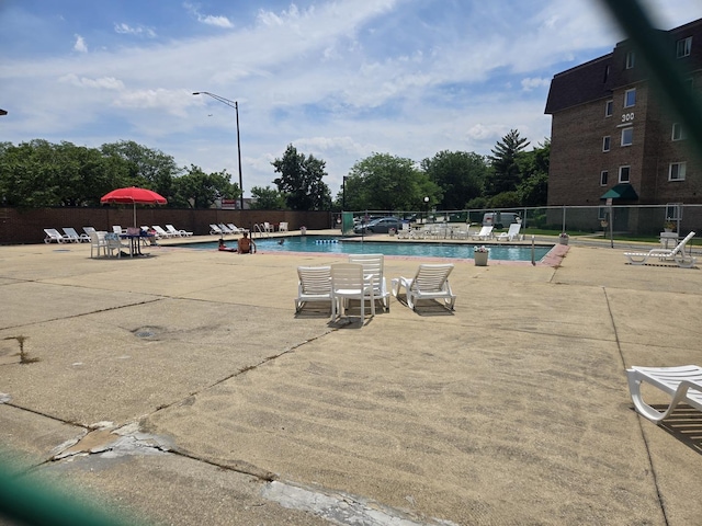 220 S Roselle Rd Unit 308, Schaumburg, IL 60193 - community pool featuring a patio