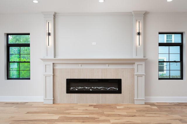 223 Center St, Naperville, IL 60540 - detailed view of a fireplace, wood finished floors, and recessed lighting