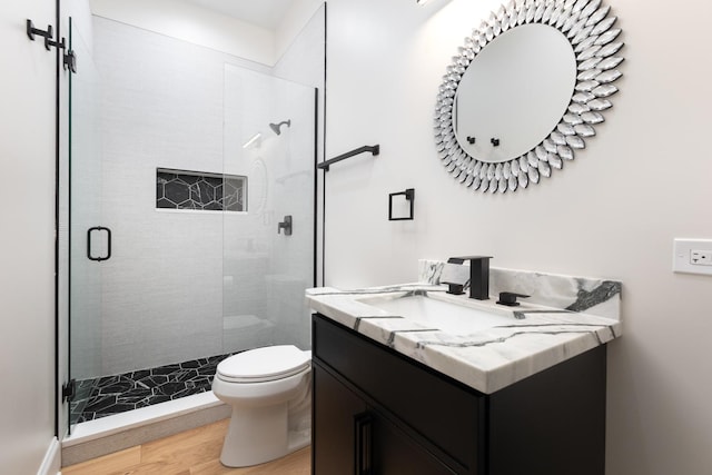 223 Center St, Naperville, IL 60540 - bathroom with wood finished floors, vanity, and a shower stall
