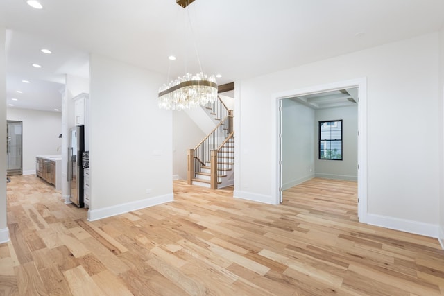 223 Center St, Naperville, IL 60540 - unfurnished dining area with stairs, light wood-style floors, and recessed lighting