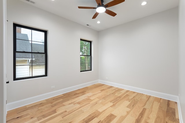 223 Center St, Naperville, IL 60540 - empty room with light wood finished floors, recessed lighting, and ceiling fan