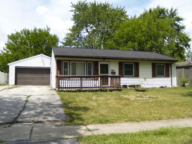22340 Chappel Ave, Sauk Village, IL 60411 - ranch-style home with a detached garage, a front lawn, and an outdoor structure