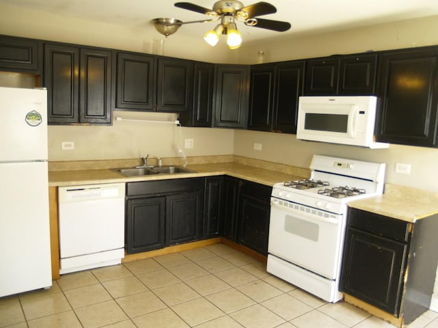 22340 Chappel Ave, Sauk Village, IL 60411 - kitchen featuring white appliances, dark cabinetry, ceiling fan, light countertops, and light tile patterned flooring