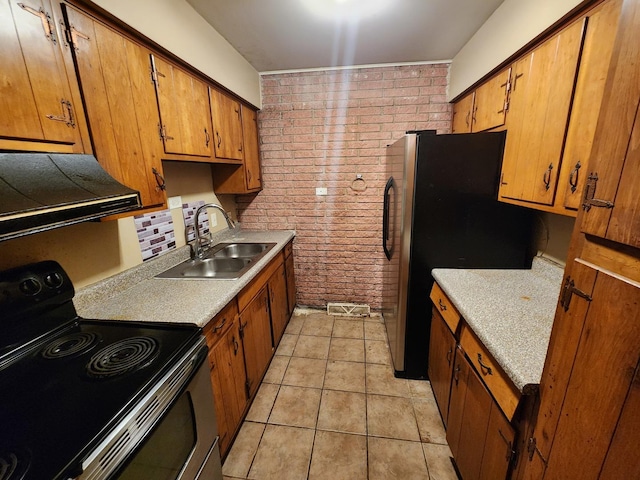 9201 S Kedzie Ave Unit 3, Evergreen Park, IL 60805 - kitchen with appliances with stainless steel finishes, brick wall, exhaust hood, brown cabinets, and light countertops