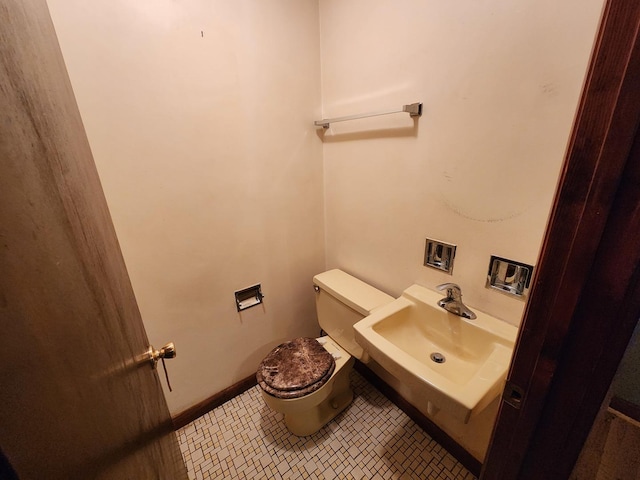 9201 S Kedzie Ave Unit 3, Evergreen Park, IL 60805 - bathroom with toilet and tile patterned flooring