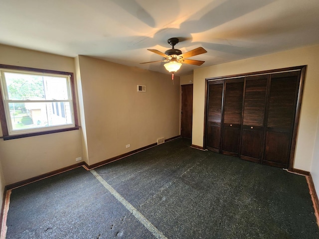 9201 S Kedzie Ave Unit 3, Evergreen Park, IL 60805 - unfurnished bedroom featuring baseboards and ceiling fan