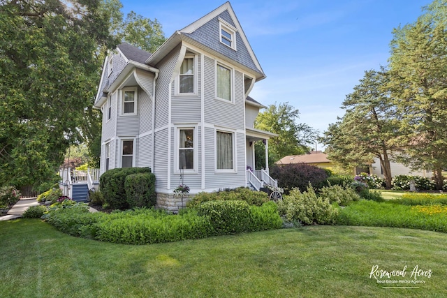 217 N Maple St, Momence, IL 60954 - view of side of home with a lawn
