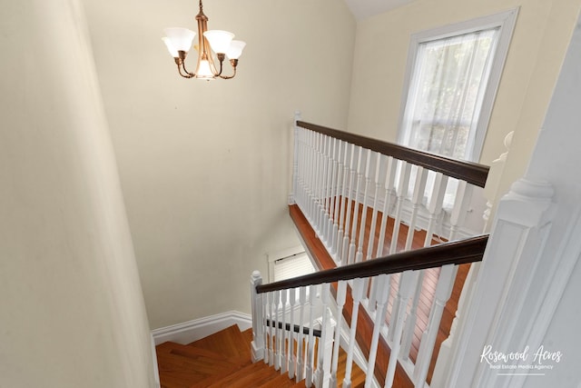 217 N Maple St, Momence, IL 60954 - stairs featuring a chandelier and baseboards