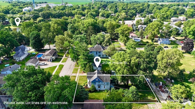 217 N Maple St, Momence, IL 60954 - aerial perspective of suburban area featuring property boundaries highlighted