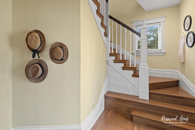 217 N Maple St, Momence, IL 60954 - staircase featuring wood finished floors and baseboards