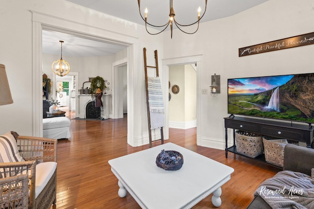 217 N Maple St, Momence, IL 60954 - living room featuring a chandelier and wood finished floors