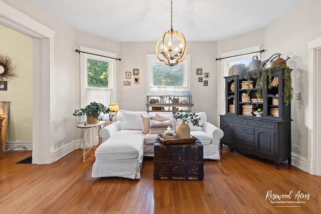 217 N Maple St, Momence, IL 60954 - sitting room with wood finished floors and a chandelier