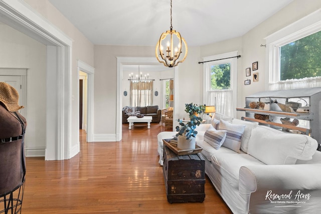 217 N Maple St, Momence, IL 60954 - living area featuring a chandelier and wood finished floors