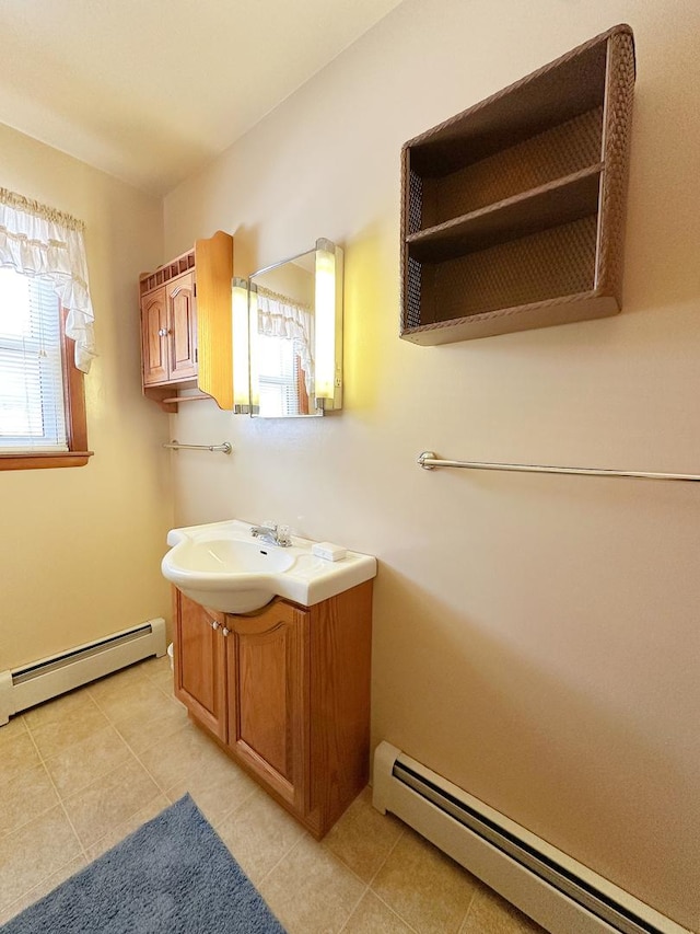 919 S Vermillion St, Streator, IL 61364 - bathroom featuring a baseboard radiator, vanity, and tile patterned floors
