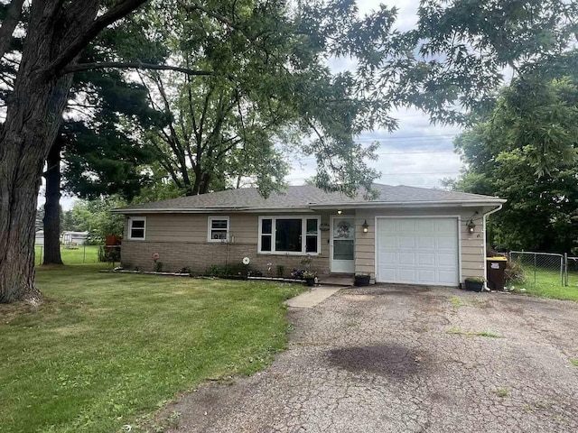 8212 Cameo Dr, Machesney Park, IL 61115 - ranch-style house with a garage and driveway
