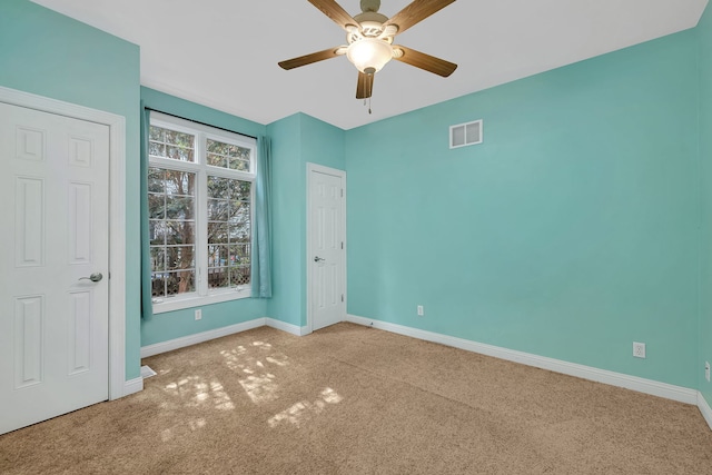 300 Village Ln, Seneca, IL 61360 - unfurnished bedroom featuring carpet flooring and ceiling fan