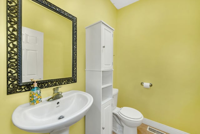 300 Village Ln, Seneca, IL 61360 - half bath with a sink and tile patterned flooring