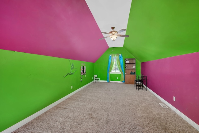 300 Village Ln, Seneca, IL 61360 - additional living space with carpet flooring, a ceiling fan, and vaulted ceiling